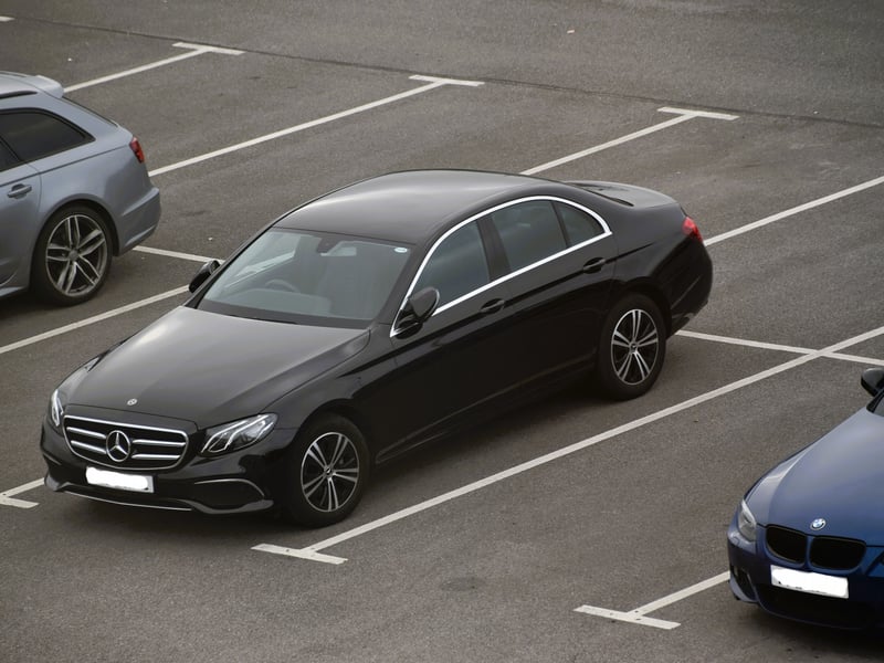 A black Mercedes-Benz E-Class saloon, one of the cars in our Dubrovnik car hire with a driver